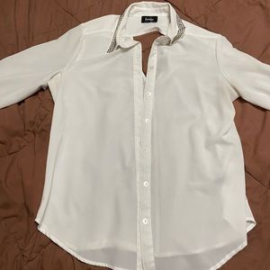 2 blouses.  1 white and 1 black with rhinestones